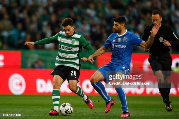 Pedro Gonçalves of Sporting CP, Mehdi Taremi of FC Porto battle for the ball during the Liga Portugal Bwin match between Sporting CP and FC Porto at...
