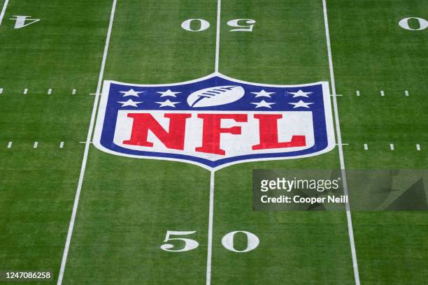 Elevated view of the NFL Shield logo painted on the field prior to Super Bowl LVII between the Kansas City Chiefs and the Philadelphia Eagles at...