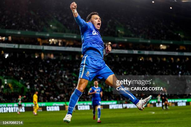Porto's Brazilian forward Pepe Cossa celebrates after scoring a goal during the Portuguese League football match between Sporting CP and FC Porto at...