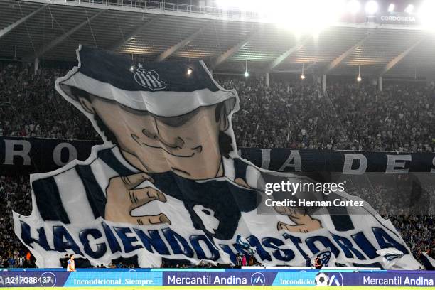 Fans of Talleres cheer for their team before a match between Talleres and Boca Juniors as part of Torneo Liga Profesional 2023 at Mario Alberto...