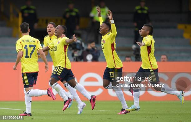 Colombia's Alexis Castillo celebrates with teammates after scoring against Venezuela during the South American U-20 championship football match at El...