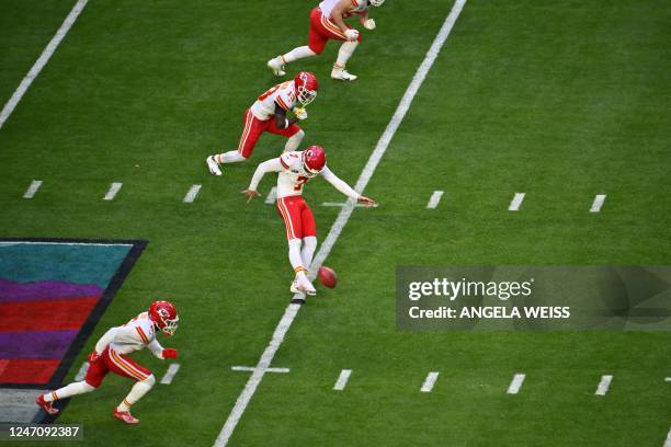 Kansas City Chiefs' kicker Harrison Butker kicks the ball for kickoff Super Bowl LVII between the Kansas City Chiefs and the Philadelphia Eagles at...
