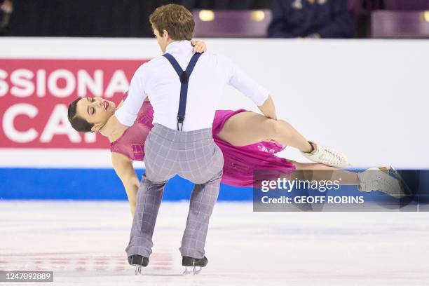 Caroline Green and Michael Parsons, of the United States, skate their free dance in the ice dance competition during the ISU Four Continents Figure...