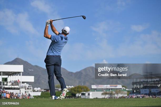 Scottie Scheffler tees off on the 17th hole during the final round of the WM Phoenix Open at TPC Scottsdale on February 12, 2023 in Scottsdale,...