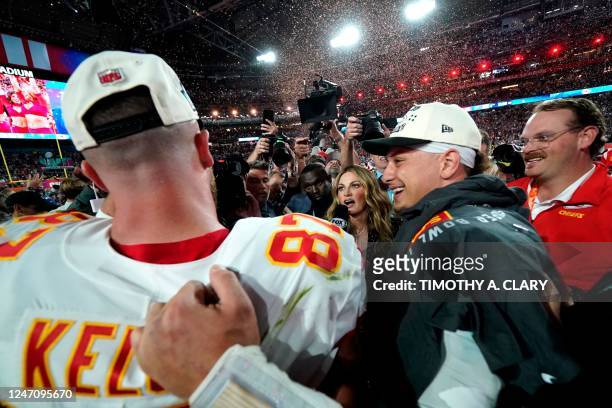 Sports commentator Erin Andrews speaks to Kansas City Chiefs' tight end Travis Kelce and Kansas City Chiefs' quarterback Patrick Mahomes as they...