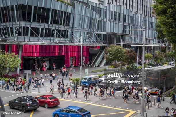 Pedestrians at Orchard Road in Singapore, on Saturday, Feb. 11, 2023. Singapore will report the budget for the coming fiscal year on Tuesday, will...