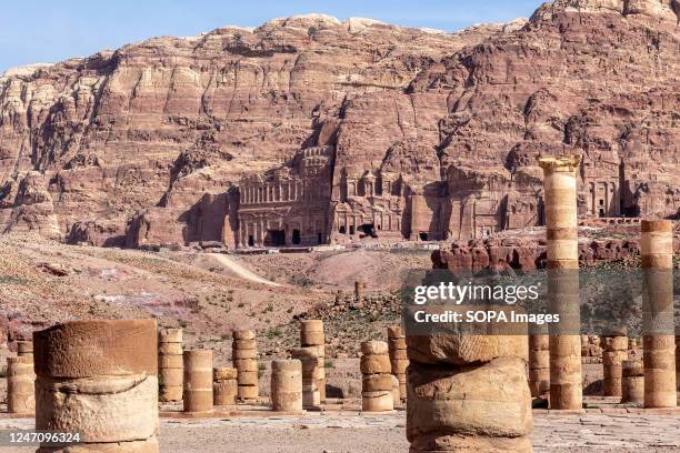 Local scars and remains of Great Temple of Petra in front of the Royal Tombs in Petra, a famous archaeological site. Petra is a UNESCO World Heritage...