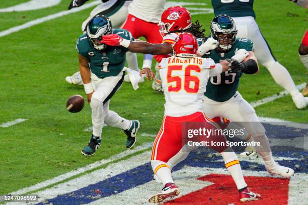 Philadelphia Eagles quarterback Jalen Hurts fumbles under pressure by Kansas City Chiefs linebacker Nick Bolton during the Super Bowl between the...