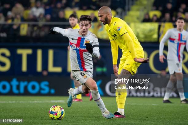 Barcelona's midfielder Pablo Paez, Gavi. And Villarreal's Etienne Capoue during La Liga match between Villarreal CF and FC Barcelona at La Ceramica...