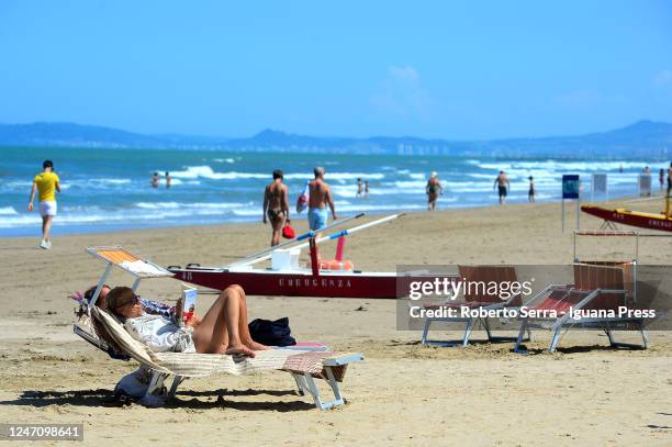 People visit Rimini beach on June 02, 2020 in Bologna, Italy. Many Italian businesses have been allowed to reopen, after more than two months of a...