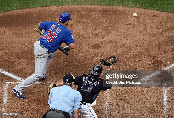 Randy Wells of the Chicago Cubs in action against the New York Mets at Citi Field on September 10, 2011 in the Flushing neighborhood of the Queens...