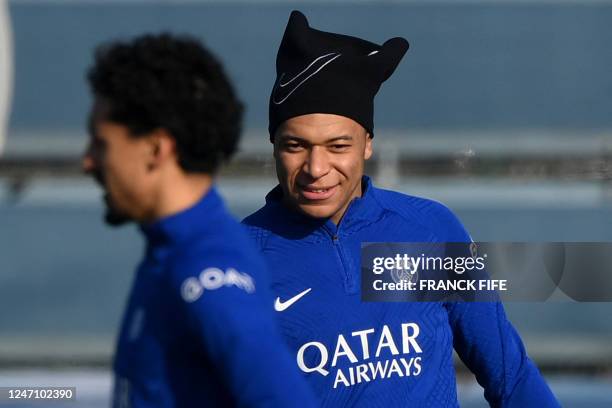 Paris Saint-Germain's French forward Kylian Mbappe takes part in a training session in Saint-Germain-en-Laye, west of Paris on February 13 on the eve...