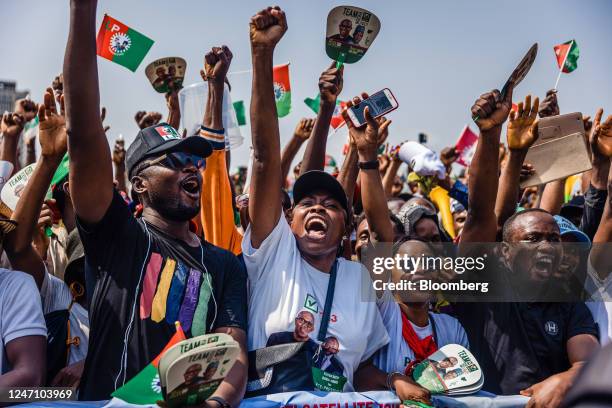 Supporters raise their hands during a campaign rally for Peter Obi, presidential candidate for the Labour Party, in Lagos, Nigeria, on Saturday, Feb....