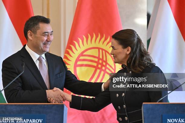 The Kyrgyz President Sadyr Japarov and the Hungarian President Katalin Novak shake hands after a joint press conference in the presidential palace in...