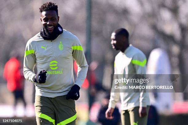 Milan's French midfielder Tiemoue Bakayoko attends a training session on February 13, 2023 at the Milanello Sports Center in Carnago, northwest of...