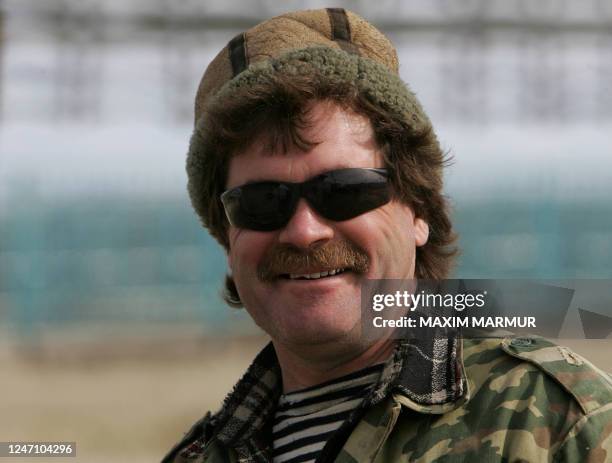 Truck driver smiles at the gaz field at the middle of a tundra in West Siberia, near Novy Urengoy 17 June 2006. Urengoy gas field is the world's...