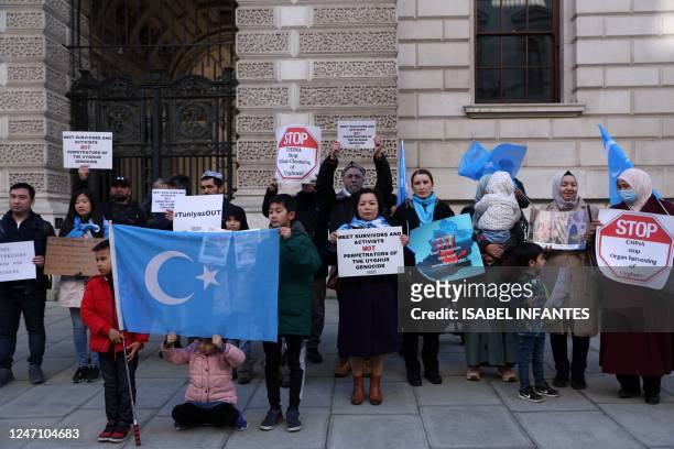 Uyghur activist and artist, Rahima Mahmut attends a vigil outside the Foreign, Commonwealth and Development Office in London on February 13...