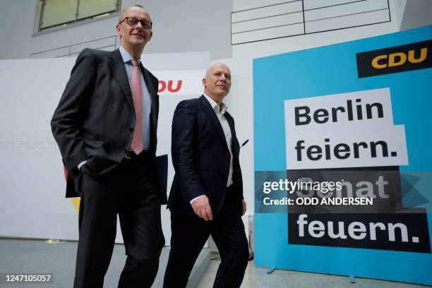 Leader of Germany's conservative Christian Democratic Union party Friedrich Merz and Christian Democratic Union party's top candidate Kai Wegner...