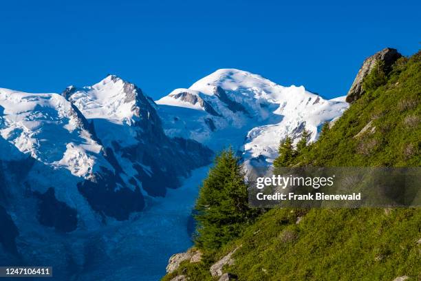 The summits of Mont Maudit and Mont Blanc, from left, and the Bossons Glacier, seen from Le Brevent.