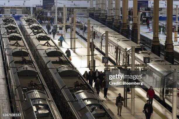 Travellers walk along platforms at London Liverpool Street railway station in the City of London, UK, on Monday, Feb. 13, 2023. Network Rail Ltd. Are...