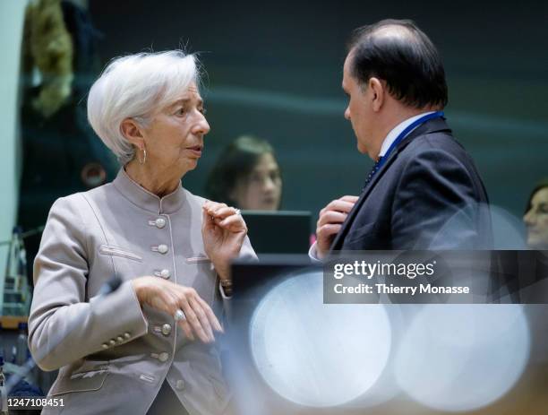 President of the European Central Bank Christine Lagarde is talking with the head of the French treasury Emmanuel Moulin prior the start of an...
