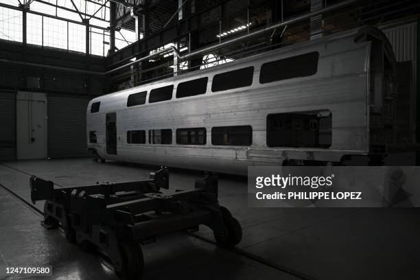 This photograph taken on February 13, 2023 shows a coach of the new SNCF's TGV "M" next generation high-speed at the Alstom plant in Aytre near La...