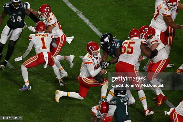 Super Bowl LVII: Kansas City Chiefs Patrick Mahomes in action, takes a knee vs Philadelphia Eagles Fletcher Cox at State Farm Stadium. Glendale, AZ...