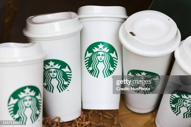 Starbucks reusable cups are seen on display in Starbucks Coffeee in Krakow, Poland on February 10, 2023.