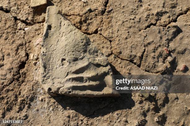 Clay tablet bearing fingerprints is seen at the newly-excavated trench at the site of the ancient city-state of Lagash, in Iraq's al-Shatra district...