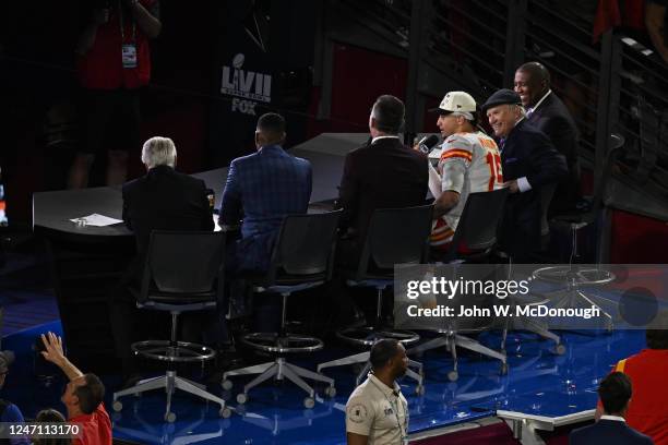 Super Bowl LVII: Kansas City Chiefs Patrick Mahomes sits on the set of Fox Sports with Jimmy Johnson, Michael Strahan, Howie Long, Terry Bradshaw and...