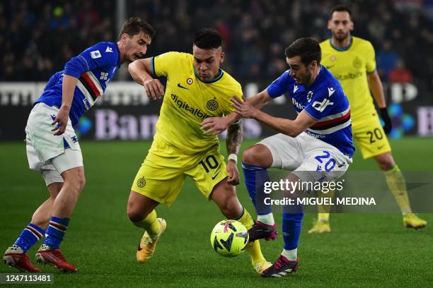 Inter Milan's Argentinian forward Lautaro Martinez challenges Sampdoria's Serbian midfielder Filip Djuricic and Sampdoria's British midfielder Harry...