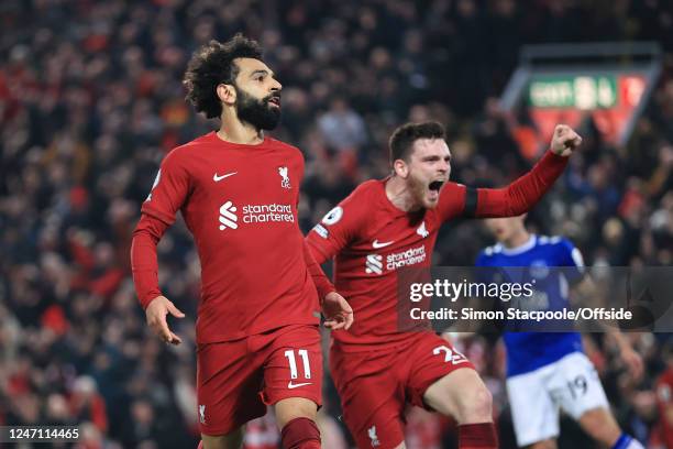 Mohamed Salah of Liverpool and Andy Robertson of Liverpool celebrate their first goal during the Premier League match between Liverpool FC and...