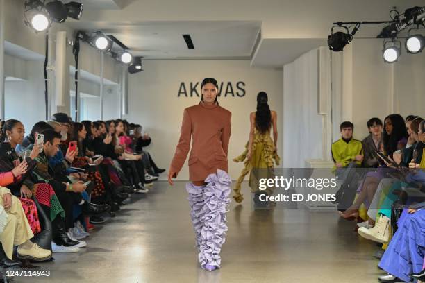 Model presents a creataion at Spring Studios during the AKNVAS Fall/Winter 2023 runway show, designed by Christian Juul Nielsen, during New York...