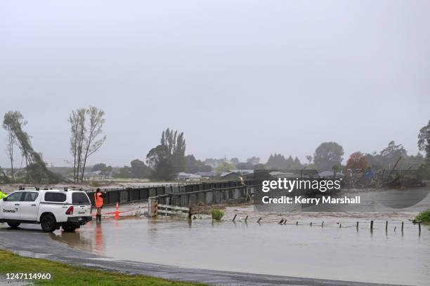 Redcliffe Bridge is closed off as debris piles up along the Tutaekuri River in the suburb of Taradale on February 14, 2023 in Napier, New Zealand....