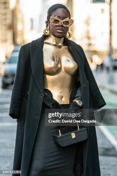 Amanda Finesse is seen wearing sunglasses by Pearls and Swine, handbag by Brandon Blackwood, custom top and skirt, shoes by Fashion Nova to New York...