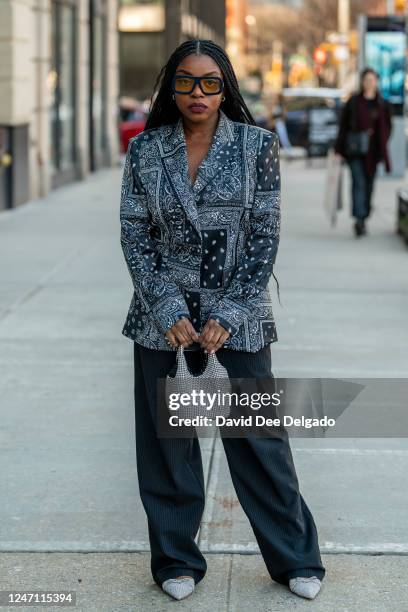 Sweetie Mensah is seen wearing a blazer by Zerina Akers, pants by Zara, handbag by Bloomingdales and shoes by Mach Mach to New York Fashion Week at...