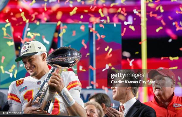 Kansas City Chiefs quarterback Patrick Mahomes hoists the Lombardi Trophy after leading the Chiefs to a Super Bowl LVII victory, 38-35, over the...