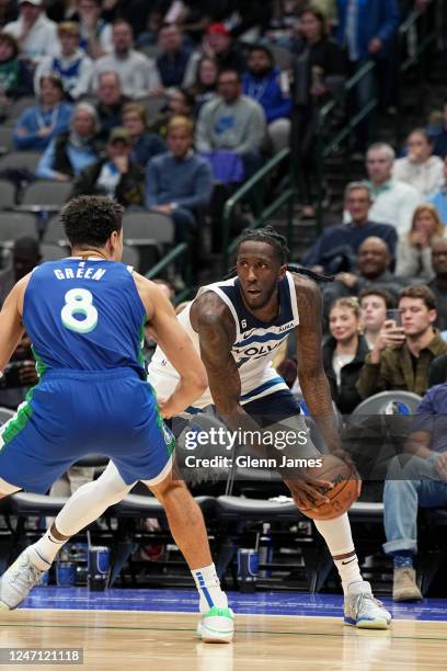 Naz Reid of the Minnesota Timberwolves moves the ball during the game against the Dallas Mavericks on February 13, 2023 at the American Airlines...