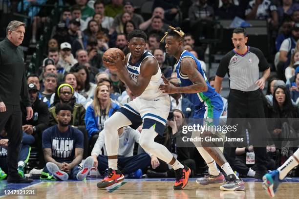 Anthony Edwards of the Minnesota Timberwolves moves the ball during the game against the Dallas Mavericks on February 13, 2023 at the American...