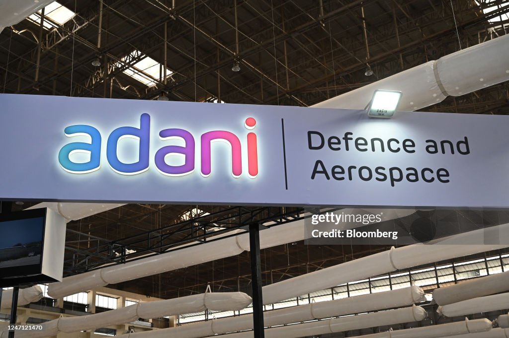 Signage of Adani Defence and Aerospace at its booth during the Aero