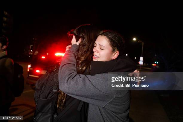 Michigan State University students hug during an active shooter situation on campus on February 13, 2023 in East Lansing, Michigan. Five people were...