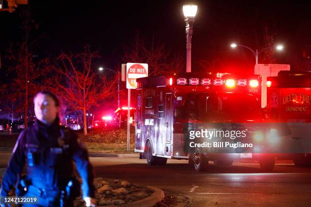 Police and emergency vehicles are on the scene of an active shooter situation on the campus of Michigan State University on February 13, 2023 in East...