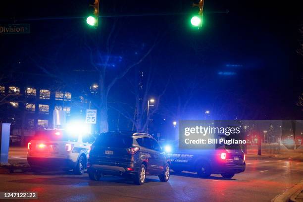 Police and emergency vehicles are on the scene of an active shooter situation on the campus of Michigan State University on February 13, 2023 in East...