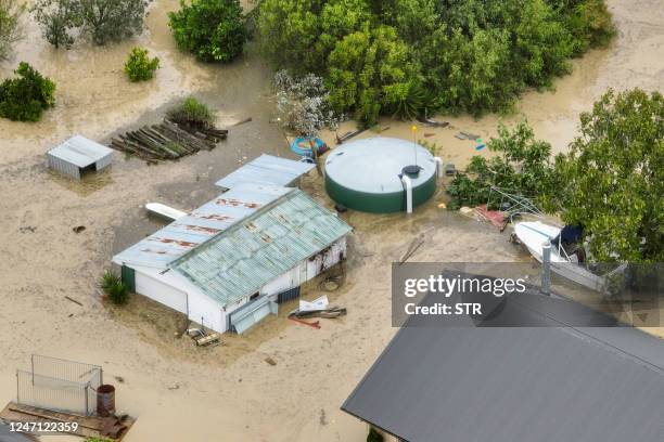 An aerial photo taken on February 14, 2023 shows flooding caused by Cyclone Gabrielle in Awatoto, near the city of Napier. - New Zealand declared a...