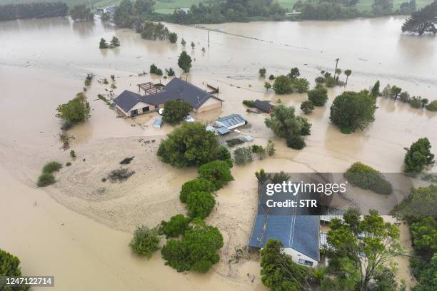 An aerial photo taken on February 14, 2023 shows flooding caused by Cyclone Gabrielle in Awatoto, near the city of Napier. - New Zealand declared a...