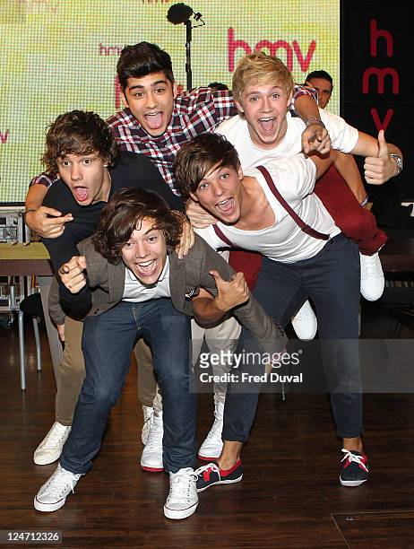 Louis Tomlinson, Harry Styles, Zian Malik, Liam Payne, Niall Horan and of One Direction attends the launch of their debut single 'What Makes You...