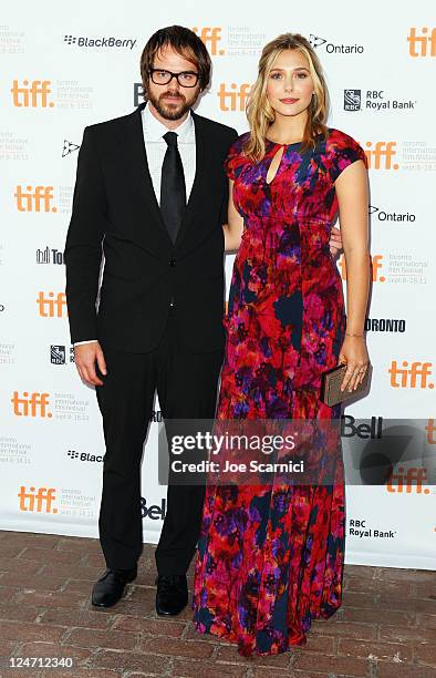 Director Sean Durkin and actress Elizabeth Olsen attend the "Martha Marcy May Marlene" premiere at Ryerson Theatre during the 2011 Toronto...