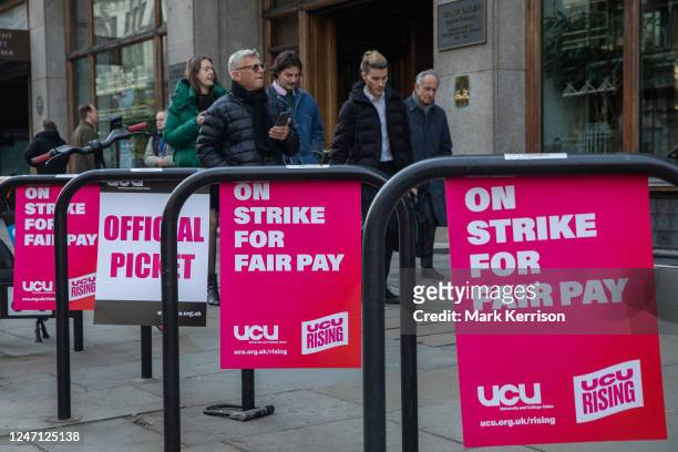 University and College Union posters are pictured at an official picket outside the University of Westminster on the second of two days of strike...