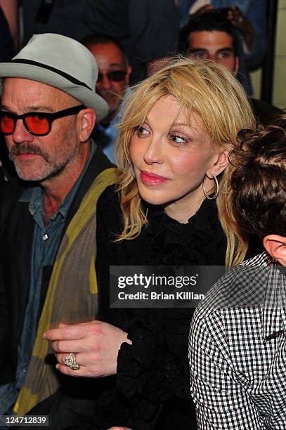 Michael Stipe and Courtney Love attend the Edun Spring 2012 fashion show during Mercedes-Benz Fashion Week at 330 West Street on September 11, 2011...