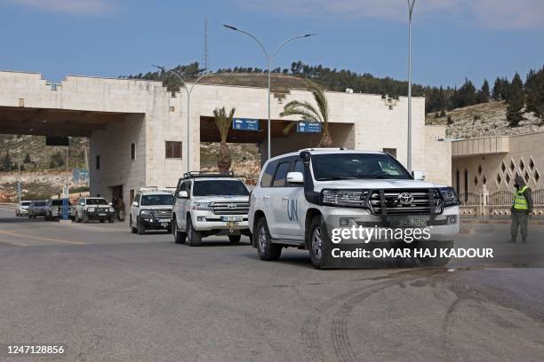 Vehicles carrying the first UN delegation to visit rebel-held northwestern Syria, arrive through the Bab al-Hawa border crossing with Turkey on...